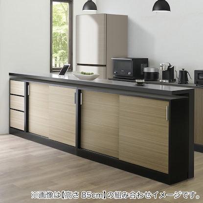 A slim cabinet with a beautiful wood grain pattern and drawers (width 31 x height 85 cm NGY)