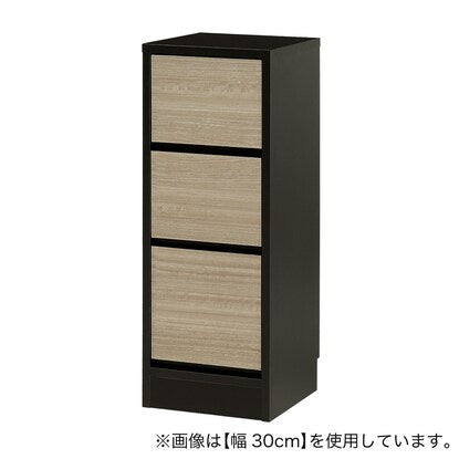 A slim cabinet with a beautiful wood grain pattern and drawers (width 32 x height 85 cm NGY)