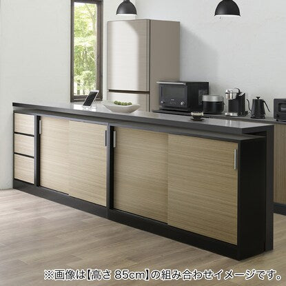 A slim cabinet with a beautiful wood grain pattern and drawers (width 32 x height 85 cm NGY)