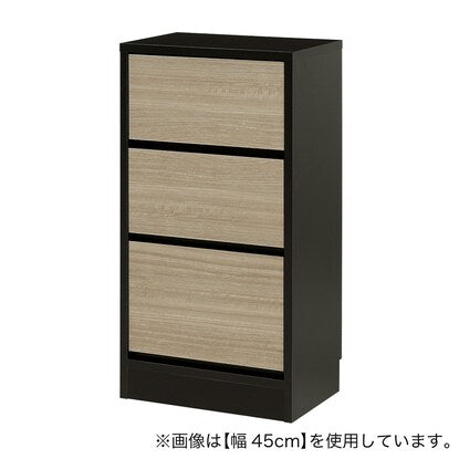 A slim cabinet with a beautiful wood grain pattern and drawers (width 42 x height 85 cm NGY)