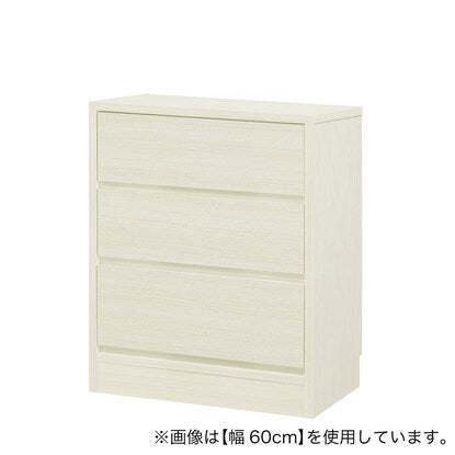 A slim cabinet with a beautiful wood grain pattern and drawers (width 51 x height 70 cm, gloss finish WW)