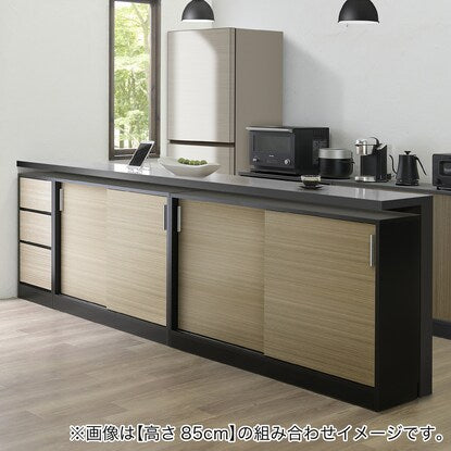 A slim cabinet with beautiful wood grain pattern and sliding doors (width 90 x height 70 cm NGY)