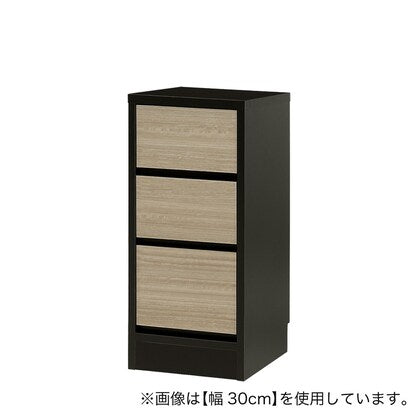 A slim cabinet with a beautiful wood grain pattern and drawers (width 30 x height 70 cm NGY)