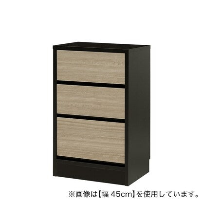 A slim cabinet with a beautiful wood grain pattern and drawers (width 42 x height 70 cm NGY)