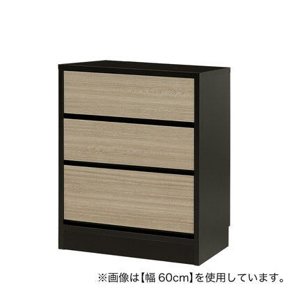 A slim cabinet with a beautiful wood grain pattern and drawers (width 52 x height 70 cm NGY)