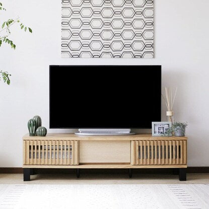 A TV stand featuring natural wood decorations (150cm wide, NA)