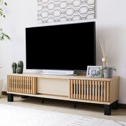 A TV stand featuring natural wood decorations (150cm wide, NA)