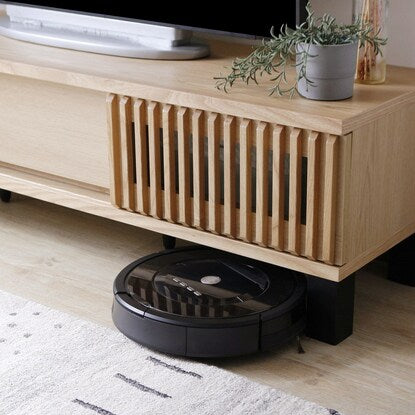 A TV stand featuring natural wood decorations (150cm wide, NA)