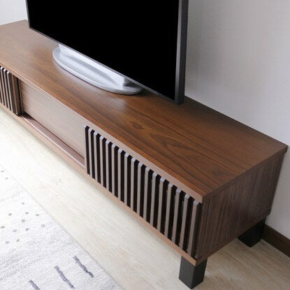 A TV stand featuring natural wood decorations (150cm wide WAL)