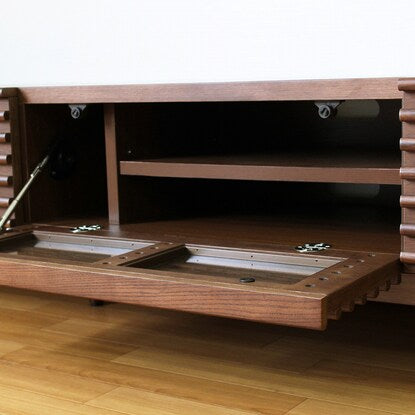 A TV stand (150 WAL) with attractive natural wood decorations