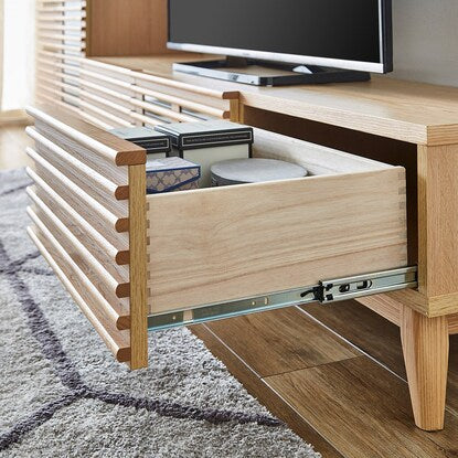 A TV stand (175 NA) with attractive natural wood decorations