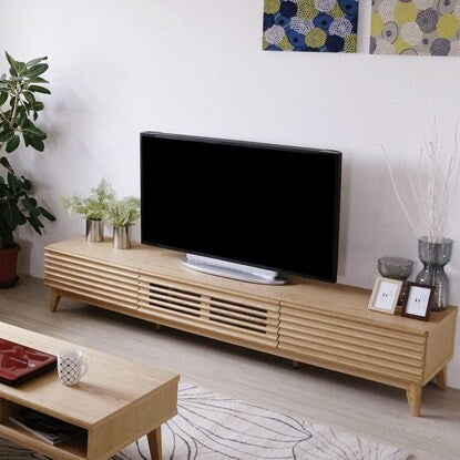 A TV stand (200 NA) with attractive natural wood decorations