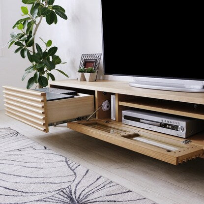 A TV stand (200 NA) with attractive natural wood decorations