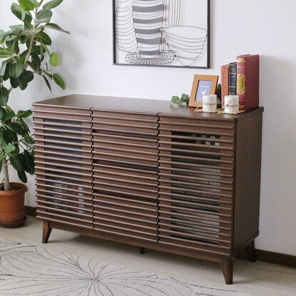 Sideboard (120 WAL) with attractive natural wood decorations