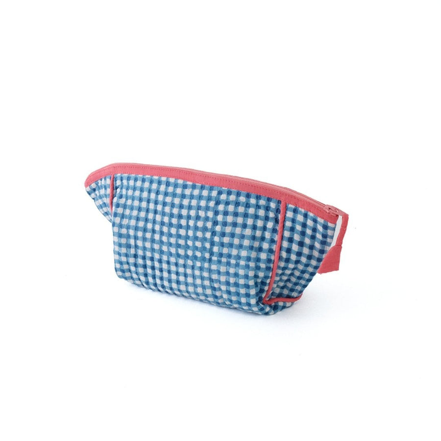 A block-printed gingham check pouch that makes it easy to see inside