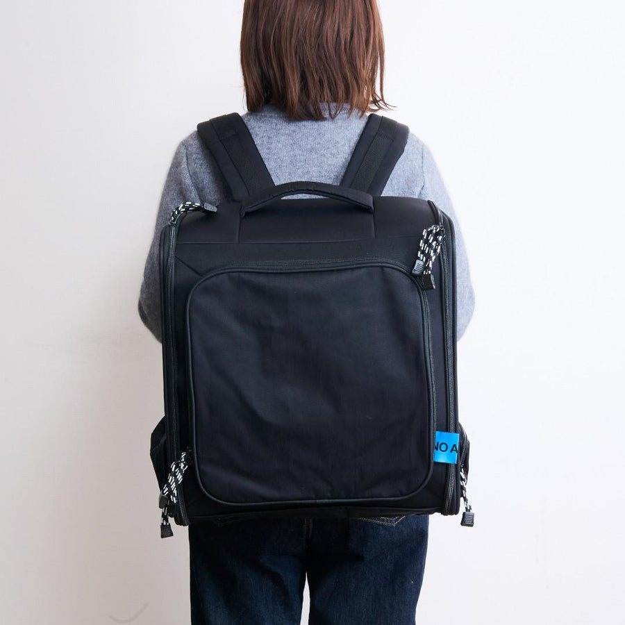 A lightweight pet backpack that can be folded and used as a cage