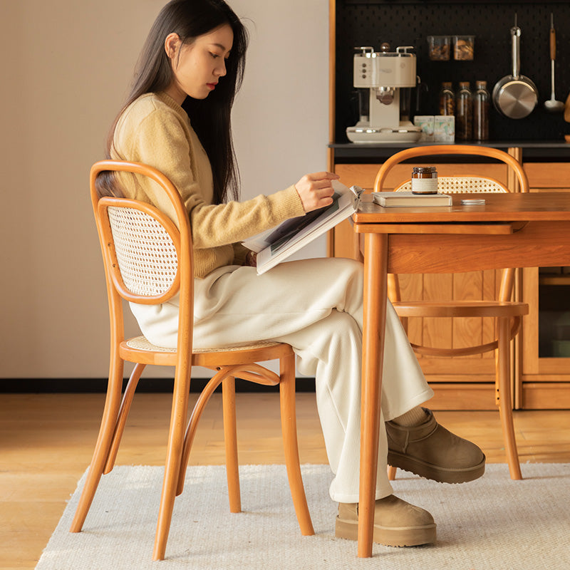 Rattan style round wood dining chair