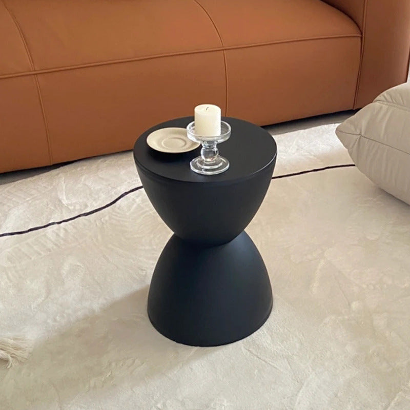 Hourglass-shaped round stool