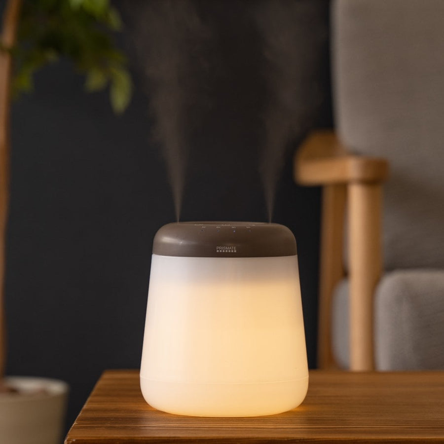 Cordless top-fill humidifier with dual mist function that prevents water spills even if it falls over