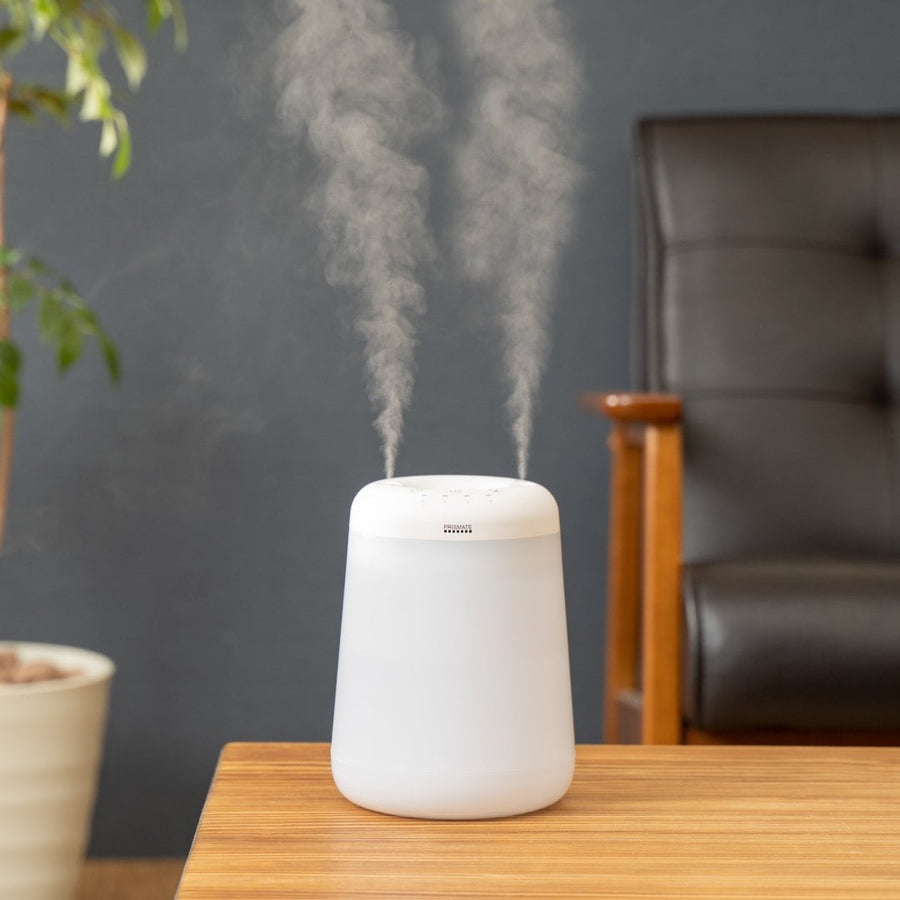 Cordless top-fill humidifier with dual mist function that prevents water from spilling even if it falls over.