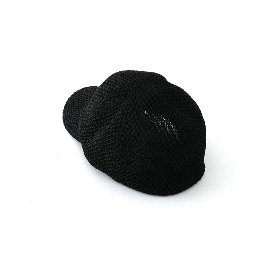 A paper cap that lets air through