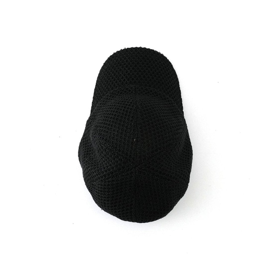 A paper cap that lets air through