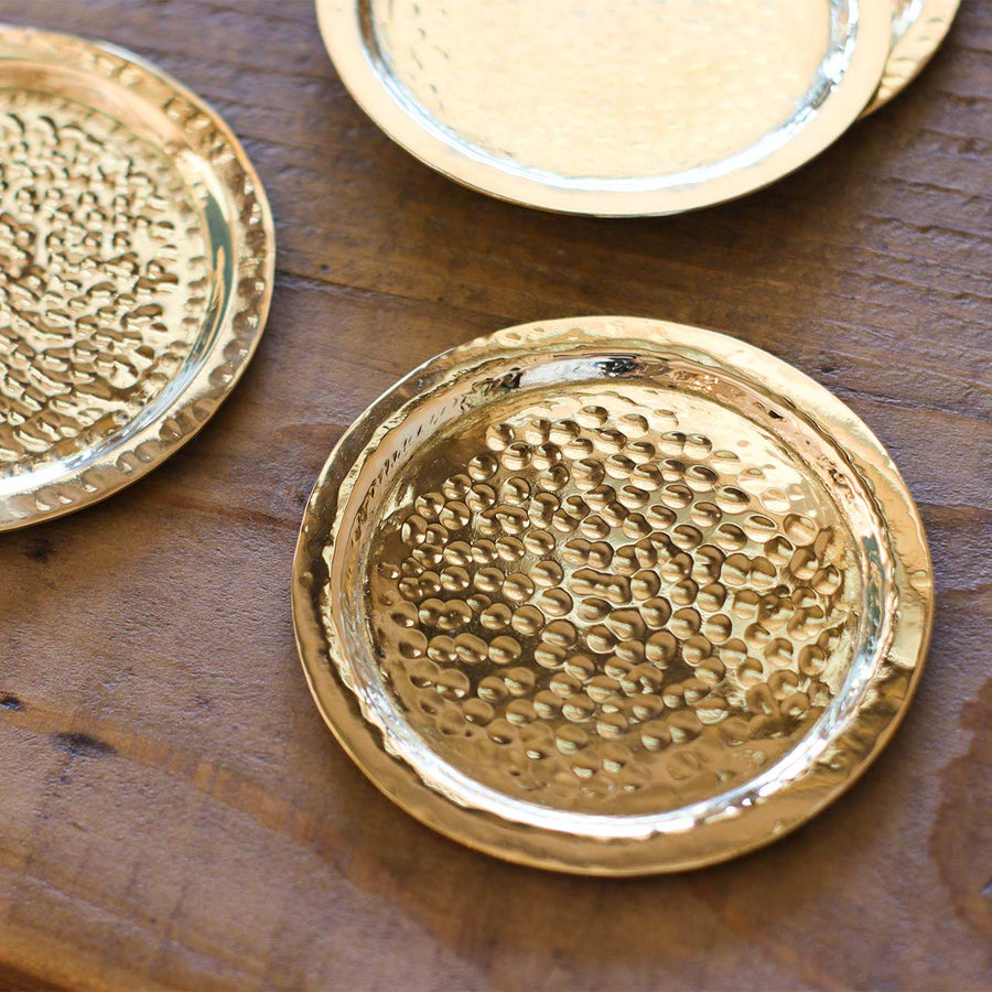 in bloom in bloom brass coaster round