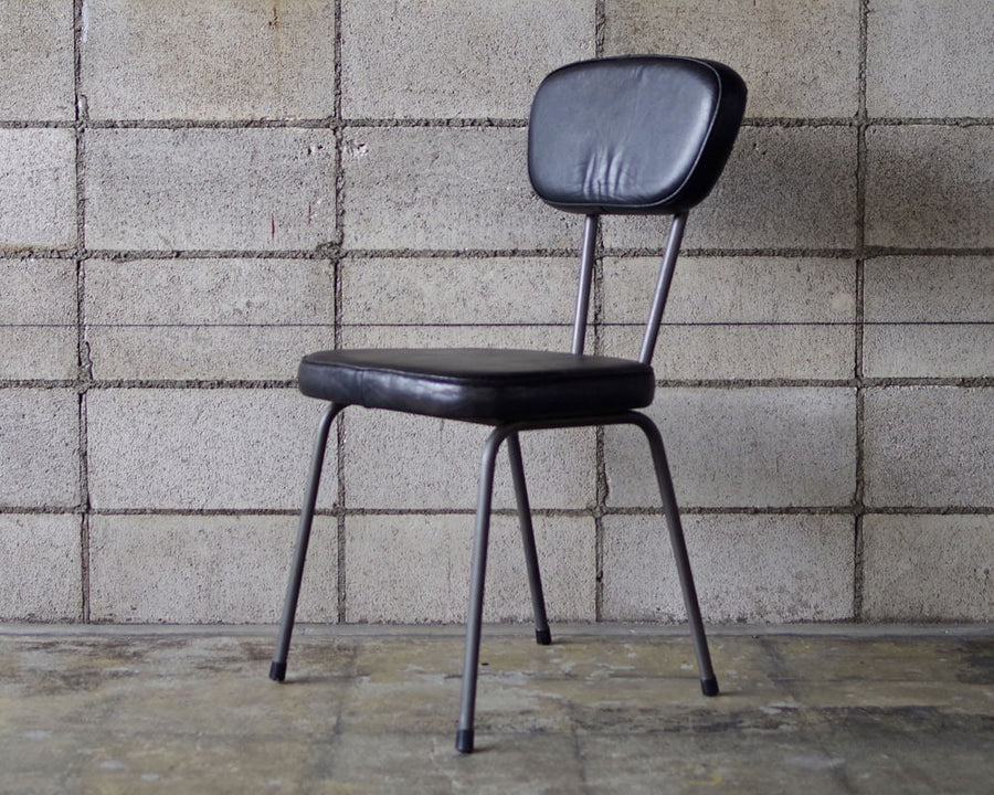 AN LEATHER CHAIR