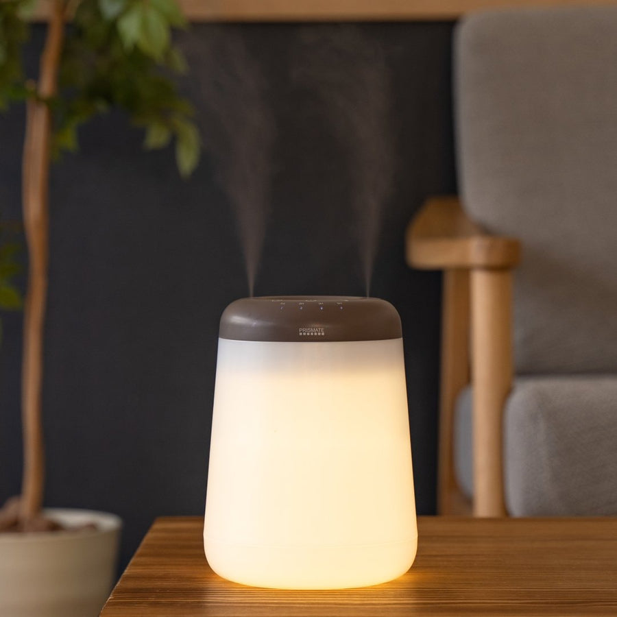 Cordless top-fill humidifier with dual mist function that prevents water from spilling even if it falls over.