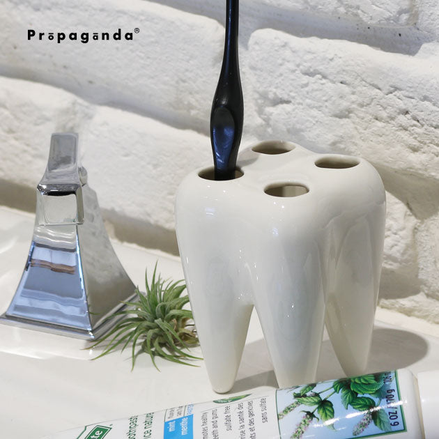 TOOTHBRUSH HOLDER