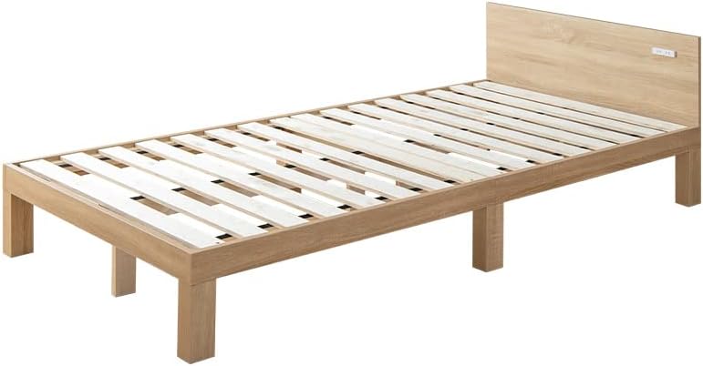 Single bed with outlet and slatted base