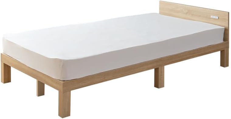 Single bed with outlet and slatted base