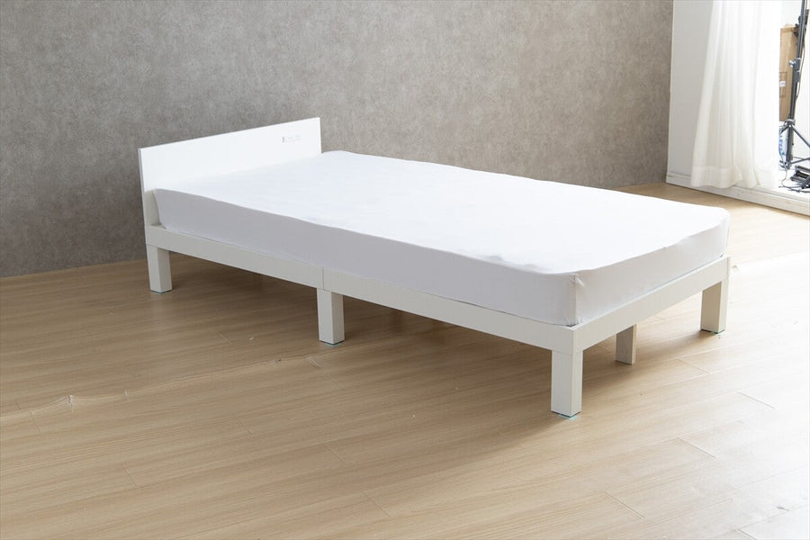 Single bed with outlet and slatted base