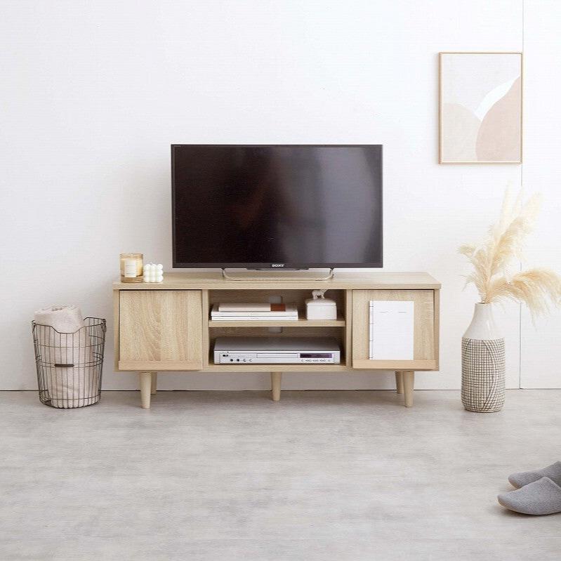 Compact flap door TV stand