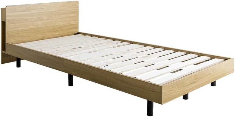 Simple single bed with outlet, headboard and bonnell mattress