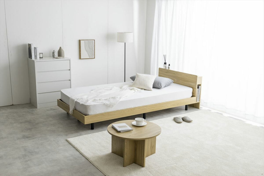 Simple single bed with outlet, headboard and bonnell mattress
