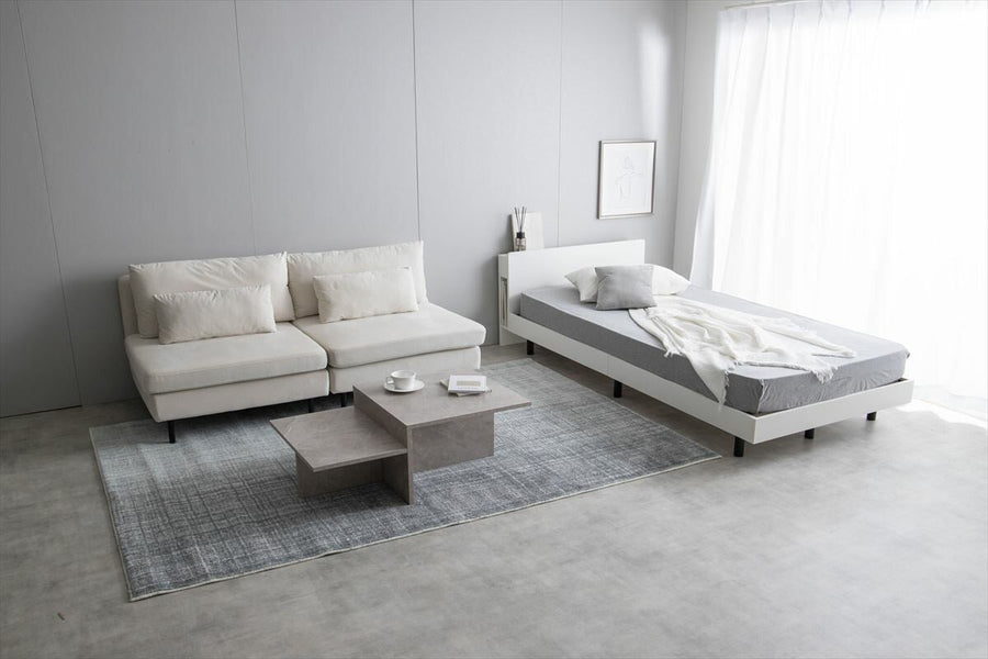 Simple single bed with outlet, headboard and bonnell mattress