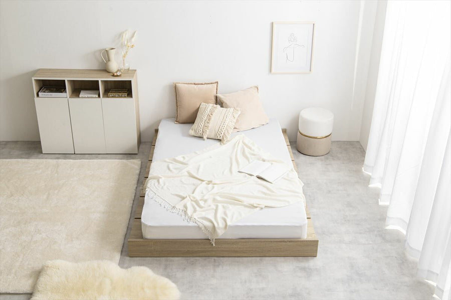 Scandinavian bonnell mattress with wide slatted semi-double low bed