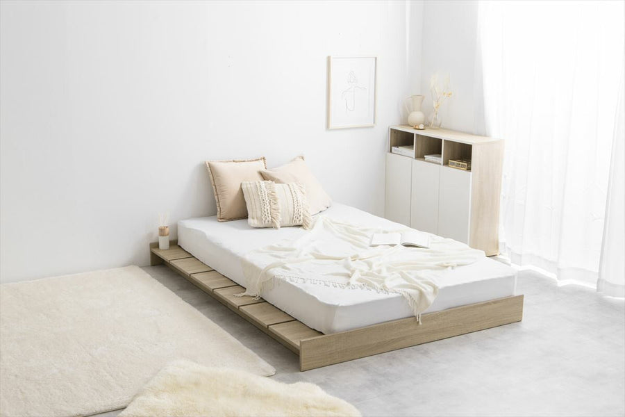 Scandinavian bonnell mattress with wide slatted semi-double low bed