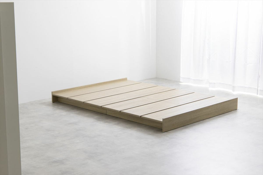 Scandinavian bonnell mattress with wide slatted semi-double low bed