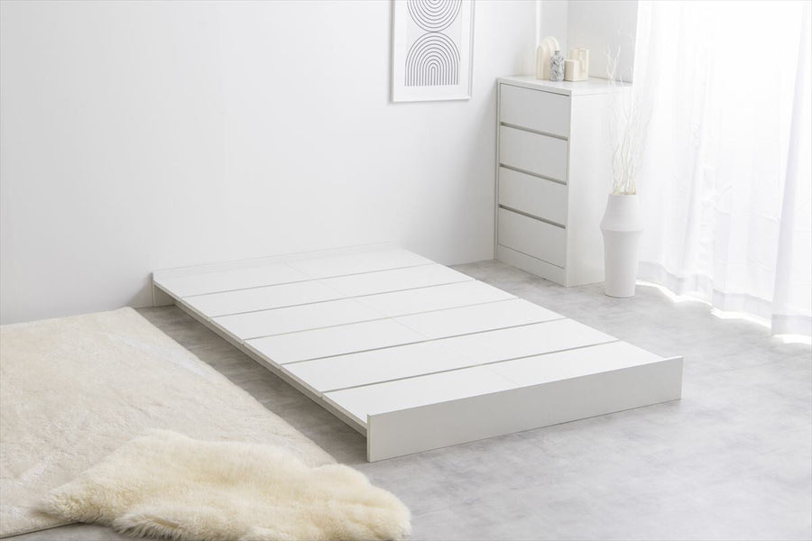 Scandinavian bonnell mattress with wide slatted semi-double low bed