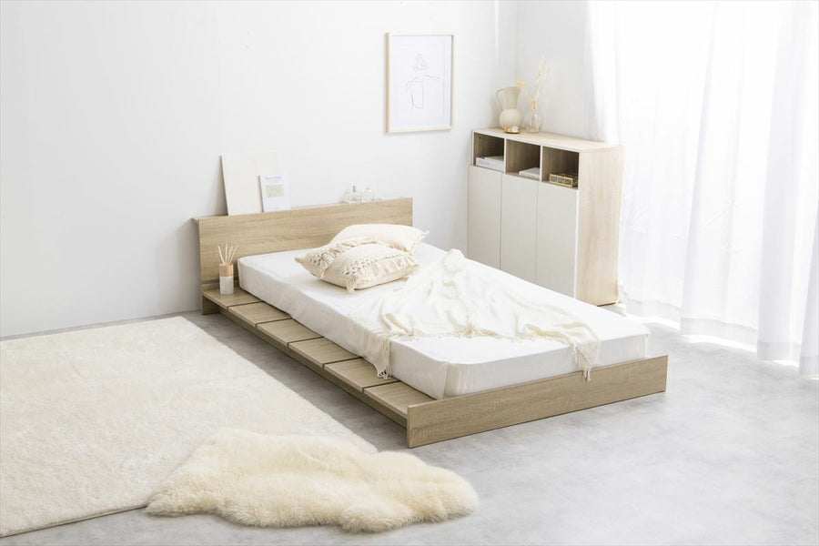 Scandinavian headboard, wide slatted semi-double low bed with bonnell mattress
