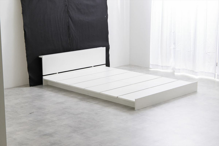 Scandinavian headboard, wide slatted semi-double low bed with bonnell mattress