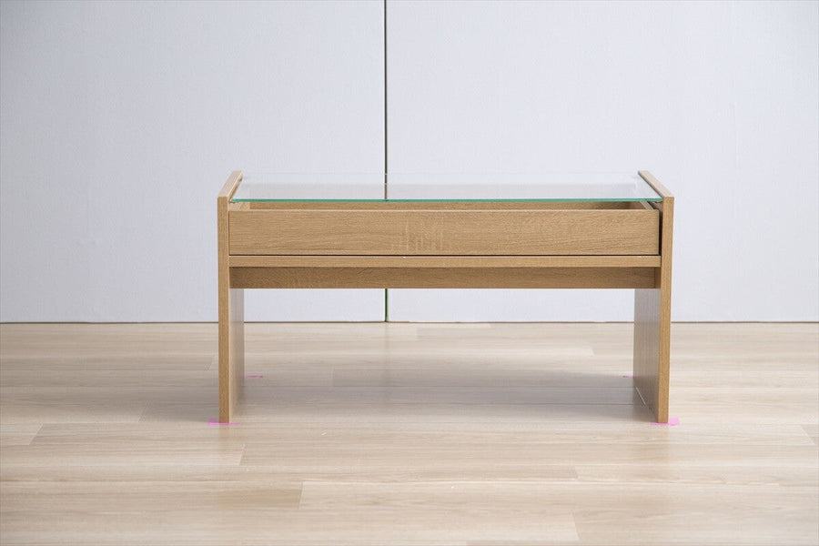 Modern wooden center table with glass top and drawer tray