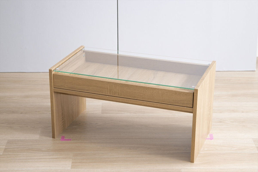 Modern wooden center table with glass top and drawer tray