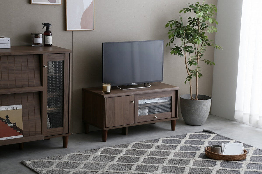 Modern wooden TV stand with glass doors