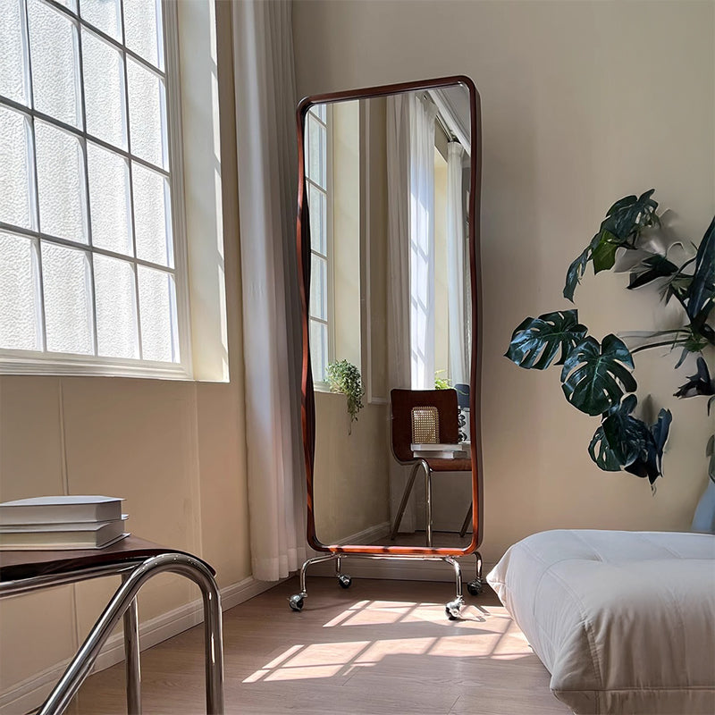 Rotating full-length mirror magazine rack