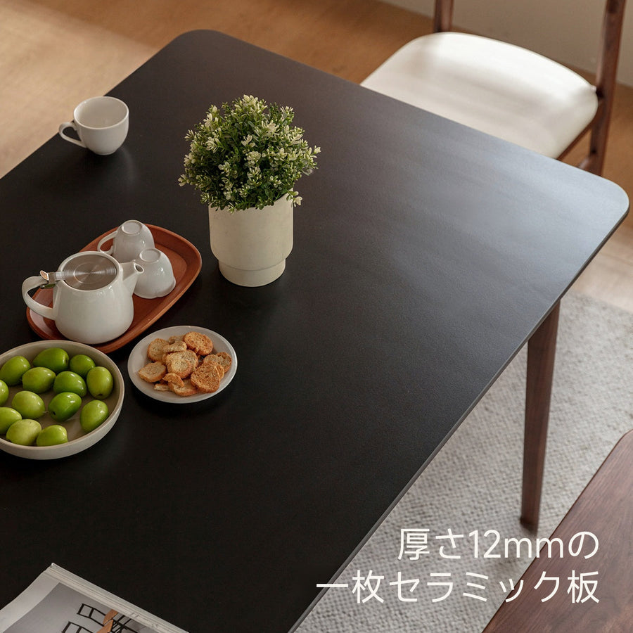 Walnut wood single ceramic top dining table