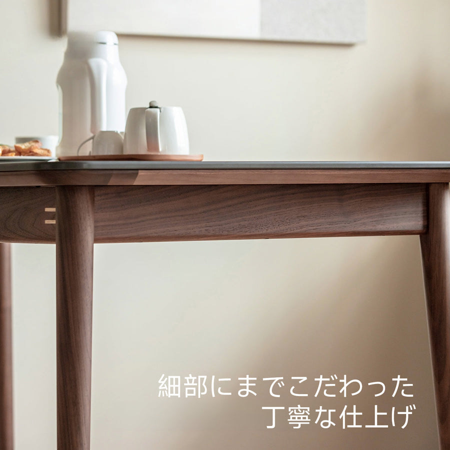 Walnut wood single ceramic top dining table