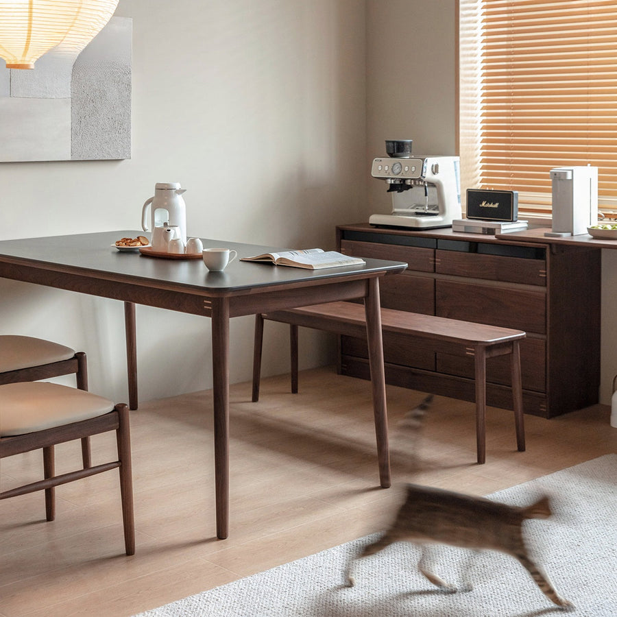 Walnut wood single ceramic top dining table